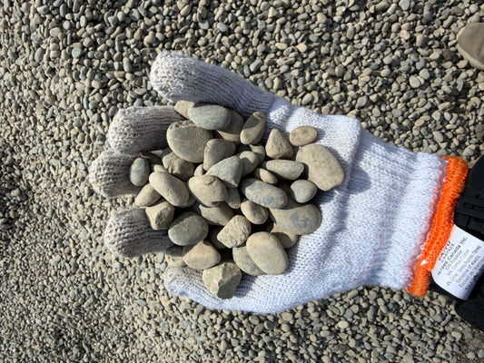 20mm round rock bulk delivery Calgary — smooth river rock for landscaping and water features