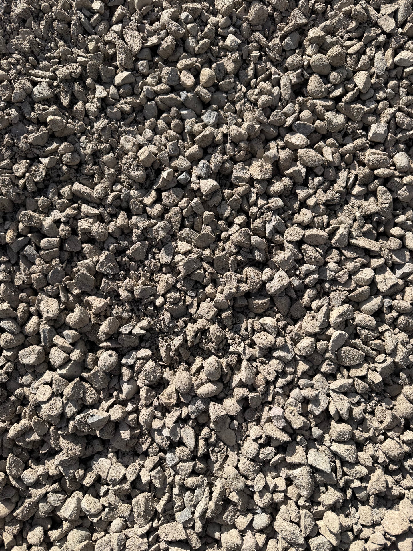 25mm road crush gravel close-up bulk delivery Calgary — driveway and paving stone base