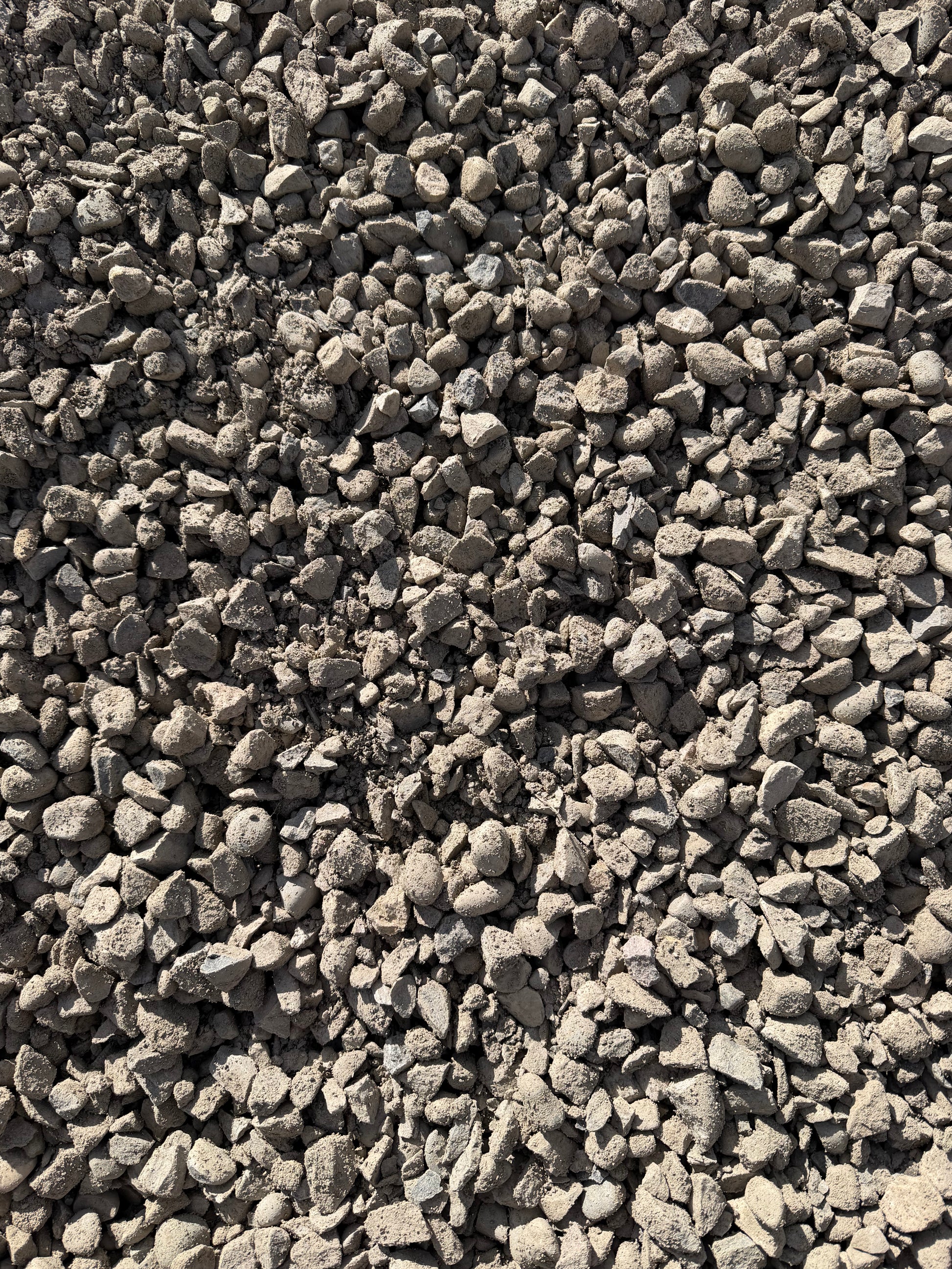 25mm road crush gravel close-up bulk delivery Calgary — driveway and paving stone base