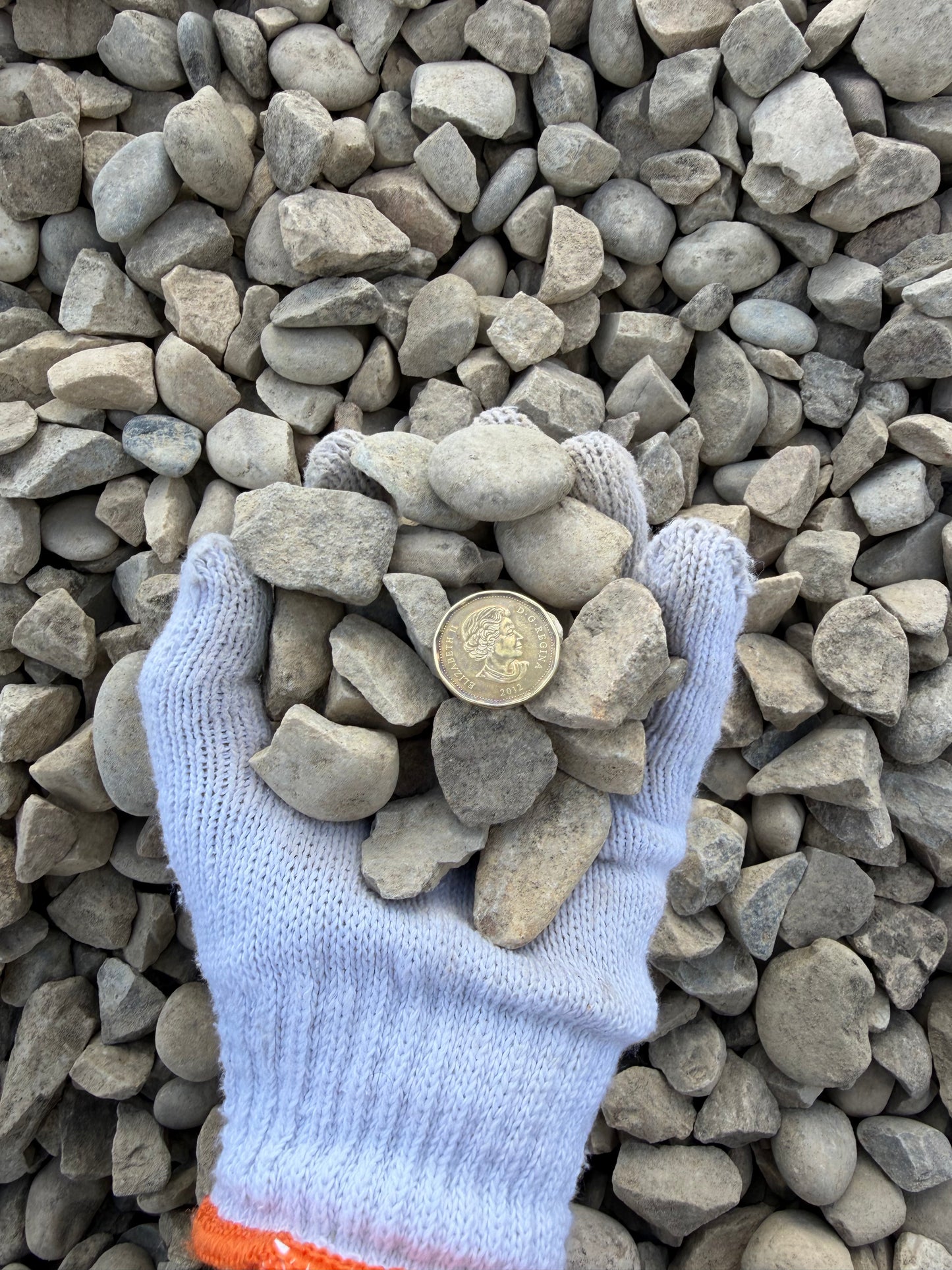 40mm drain rock French drain installation Calgary yard drainage solution