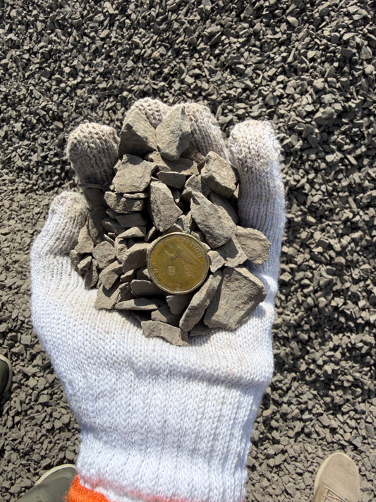 20mm Rundle rock front yard Calgary low-maintenance landscaping — bulk delivery in Calgary